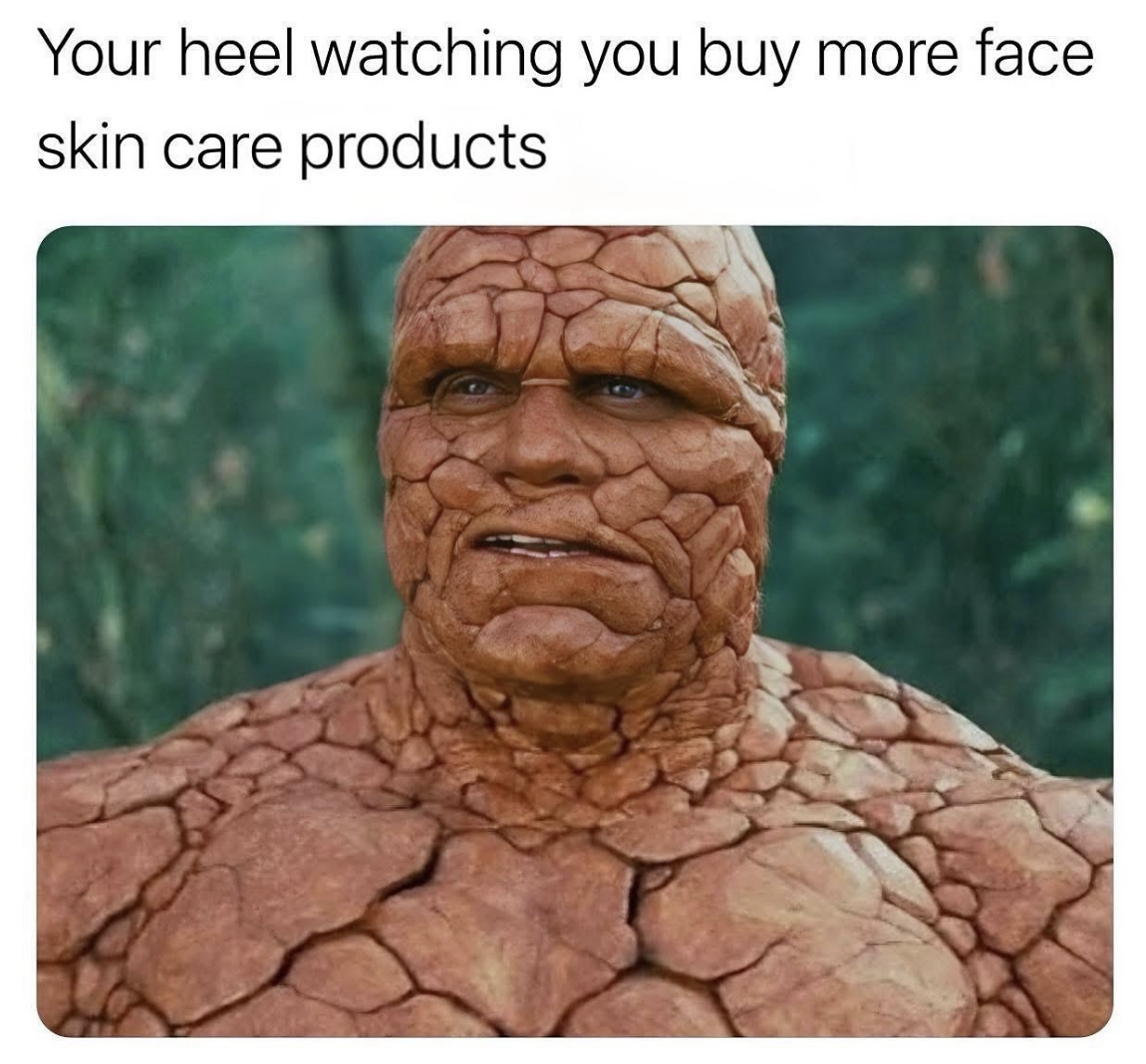 Meme of The Thing from Fantastic Four staring warily into the distance, captioned 'Your heel watching you buy more face skin care products.'