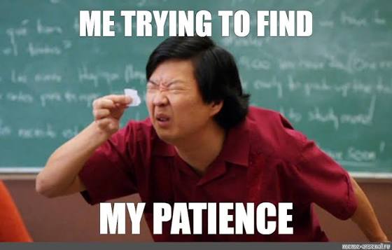 A meme of Ken Jeong in a classroom, squinting hard at a tiny scrap of paper held up to his face, with white text reading: 'Me trying to find my patience.'