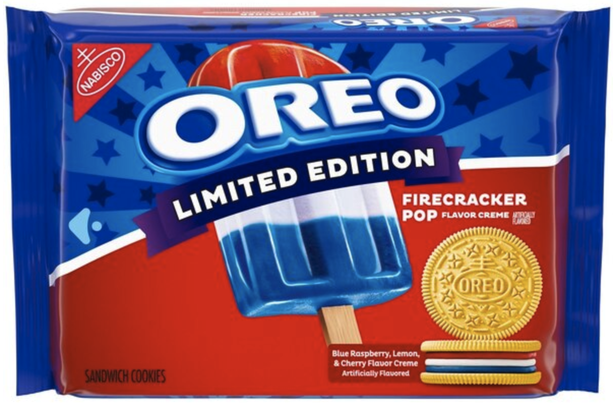 A red Oreo Limited Edition package dotted with blue and white stars, a 'Firecracker Pop' creme flavor banner, a red-white-and-blue popsicle graphic, and a single golden Oreo cookie; labeled blue raspberry, lemon, and cherry flavor creme.